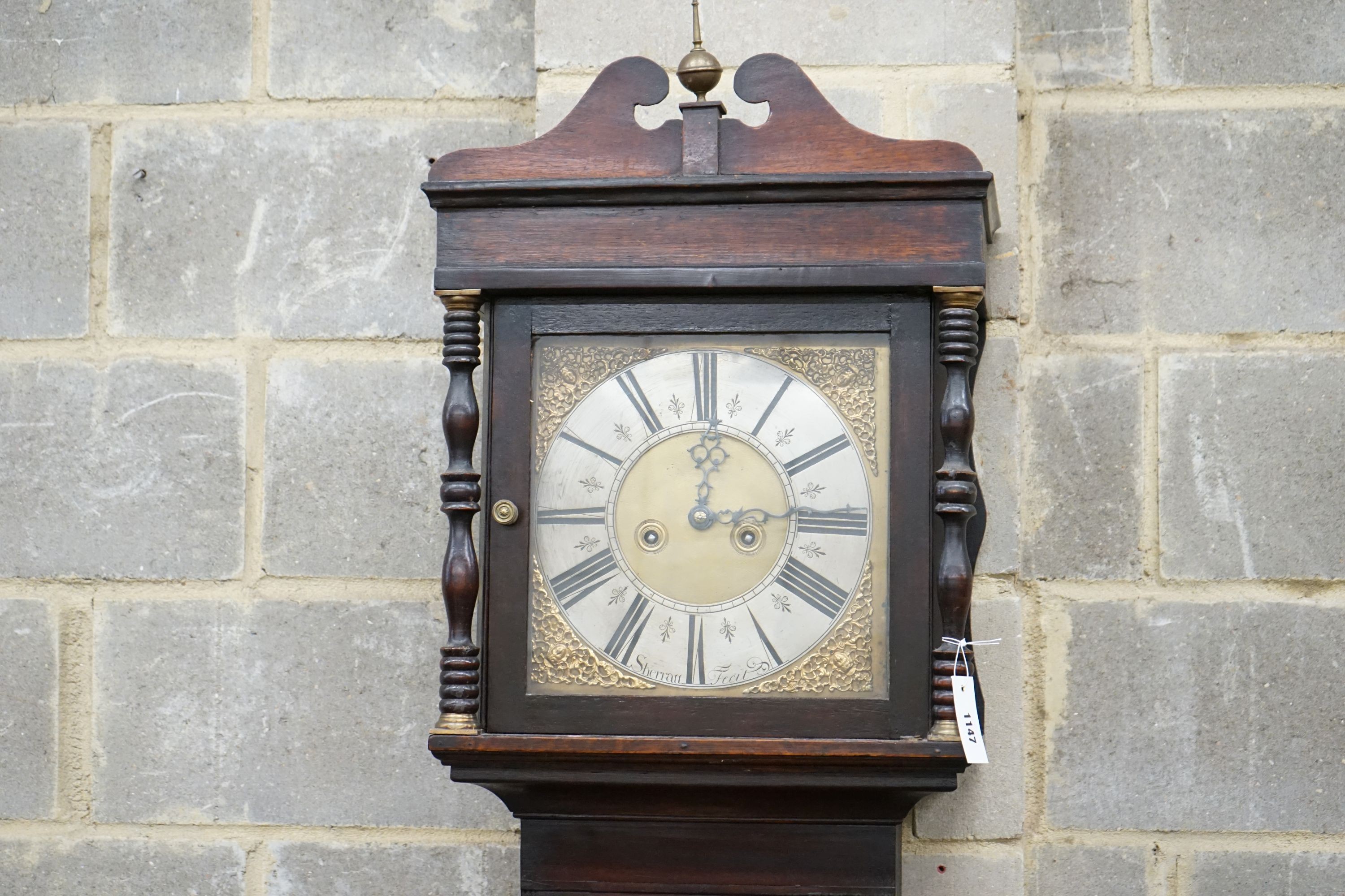 An 18th century oak eight day longcase clock, marked Sherratt, height 208cm